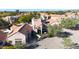 Aerial view of a community with houses, landscaping, and mountain views at 23635 N 75Th Pl, Scottsdale, AZ 85255