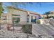 Backyard with gravel, a fence, and a patio area at 23635 N 75Th Pl, Scottsdale, AZ 85255