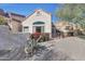 Landscaped backyard with gravel, cactus, and a stucco wall at 23635 N 75Th Pl, Scottsdale, AZ 85255