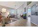 Bright living room featuring vaulted ceilings and tile floors at 23635 N 75Th Pl, Scottsdale, AZ 85255