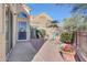 Private patio with seating area, gravel landscaping, and desert plants at 23635 N 75Th Pl, Scottsdale, AZ 85255