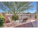 Relaxing patio area with chairs and small table at 23635 N 75Th Pl, Scottsdale, AZ 85255