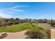 Large backyard with grassy area, patio, and mountain views at 2697 E Via Del Arboles --, Gilbert, AZ 85298