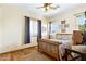 Charming bedroom with wood flooring and a wooden bed frame at 2697 E Via Del Arboles --, Gilbert, AZ 85298