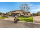Stunning two-story home with a large front yard and a long driveway at 2697 E Via Del Arboles --, Gilbert, AZ 85298