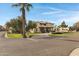 Two-story house with stucco exterior, driveway, and landscaping at 2697 E Via Del Arboles --, Gilbert, AZ 85298