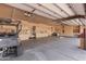 Large garage with ample space for vehicles and storage at 2697 E Via Del Arboles --, Gilbert, AZ 85298