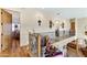 Upstairs hallway with a view into a bedroom and kitchen at 2697 E Via Del Arboles --, Gilbert, AZ 85298