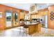 Bright kitchen with granite countertops, custom cabinetry and French doors to backyard at 2697 E Via Del Arboles --, Gilbert, AZ 85298