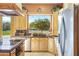 Kitchen features a large window overlooking the backyard and granite countertops at 2697 E Via Del Arboles --, Gilbert, AZ 85298
