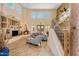 Open living room with high ceilings, a fireplace, and large windows at 2697 E Via Del Arboles --, Gilbert, AZ 85298