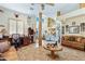 Spacious living room with a cozy sitting area and large windows at 2697 E Via Del Arboles --, Gilbert, AZ 85298