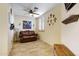 Cozy office with leather couch and ceiling fan at 2697 E Via Del Arboles --, Gilbert, AZ 85298