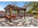 Relaxing patio with pergola, seating and outdoor furniture at 2697 E Via Del Arboles --, Gilbert, AZ 85298