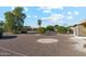 Large backyard with gravel and mature landscaping at 10515 W Oak Ridge Dr, Sun City, AZ 85351