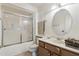 Clean bathroom featuring a shower/tub combo and vanity at 10515 W Oak Ridge Dr, Sun City, AZ 85351