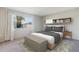 Well-lit bedroom with built-in shelving and window seat at 10515 W Oak Ridge Dr, Sun City, AZ 85351