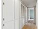 Bright hallway with access to bedrooms and closets at 10515 W Oak Ridge Dr, Sun City, AZ 85351