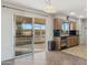 Kitchen with sliding door leading to patio at 10515 W Oak Ridge Dr, Sun City, AZ 85351