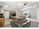 Bright kitchen with stainless steel appliances and dining area at 10515 W Oak Ridge Dr, Sun City, AZ 85351