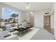 Spacious living room with large windows and ample natural light at 10515 W Oak Ridge Dr, Sun City, AZ 85351