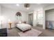 Cozy bedroom with playful decor, closet, and natural light at 1345 W Edgemont Ave, Phoenix, AZ 85007