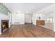 Living space featuring a fireplace and tiled floors extending into other living areas at 1345 W Edgemont Ave, Phoenix, AZ 85007