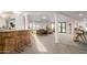 Spacious living room with an open layout, stylish decor, and sliding glass doors at 1345 W Edgemont Ave, Phoenix, AZ 85007