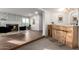 Open-concept living space with fireplace and stylish bar area at 1345 W Edgemont Ave, Phoenix, AZ 85007