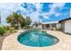 Beautiful backyard with a sparkling pool and a well-designed deck area, perfect for outdoor enjoyment at 1345 W Edgemont Ave, Phoenix, AZ 85007