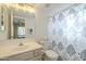 Clean bathroom with shower/tub combo and updated vanity at 14426 W Morning Star Trl, Surprise, AZ 85374