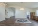 Elegant dining room with hardwood floors and chandelier at 14426 W Morning Star Trl, Surprise, AZ 85374