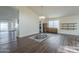 Bright dining room featuring hardwood floors and built-in shelving at 14426 W Morning Star Trl, Surprise, AZ 85374