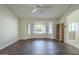 Bright living room with hardwood floors and a bay window at 14426 W Morning Star Trl, Surprise, AZ 85374