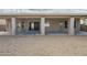 Covered patio with multiple windows and sliding glass door at 14426 W Morning Star Trl, Surprise, AZ 85374