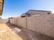 Picture of the block wall along the back of the property to separate it from other homes in the community at 16023 W Desert Hollow Dr, Surprise, AZ 85387