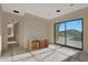 Bright bedroom with sliding glass doors and mountain views at 24820 N 107Th Way, Scottsdale, AZ 85255