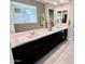A sleek bathroom featuring double sinks, elegant countertops, and a clear view of the glass walk-in shower at 2835 E Los Gatos Dr, Phoenix, AZ 85050