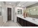 Elegant main bathroom with double vanity, stylish mirrors, and a separate shower at 2835 E Los Gatos Dr, Phoenix, AZ 85050