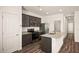 Well-equipped kitchen with an island and stainless steel appliances at 659 W Pintail Dr, Casa Grande, AZ 85122