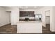 Modern kitchen with stainless steel appliances and granite countertops at 659 W Pintail Dr, Casa Grande, AZ 85122