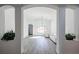 Bright living room featuring hardwood floors and recessed lighting at 7165 W Fleetwood Ln, Glendale, AZ 85303