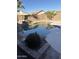 Relaxing kidney shaped pool surrounded by desert landscaping at 8724 E Nopal Cir, Mesa, AZ 85209