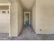 Entryway features a paved walkway, neutral stucco and a light-green door at 10559 E Simone Ave, Mesa, AZ 85212