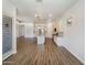 An open-concept kitchen features an island, stainless steel appliances, and plenty of cabinet space at 10559 E Simone Ave, Mesa, AZ 85212