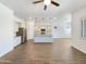 The open-concept living space features tile floors and abundant natural light at 10559 E Simone Ave, Mesa, AZ 85212