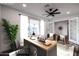 Bright home office with a large window, modern desk, and comfortable seating, ideal for productivity at 12635 N Sun Valley Dr, Sun City, AZ 85351