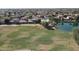 Beautiful aerial view showing the lake, golf course and community pool at 13613 W Cypress St, Goodyear, AZ 85395