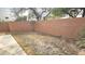 Small backyard with grassy area and block wall at 13613 W Cypress St, Goodyear, AZ 85395