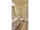 Bathroom with a shower/tub combo and vanity at 13613 W Cypress St, Goodyear, AZ 85395